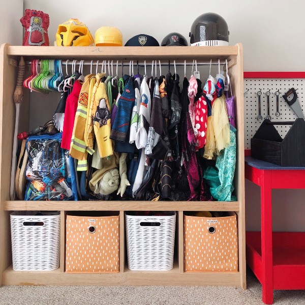 Playroom costume closet organized in rainbow order by Nolensville Home Organizing